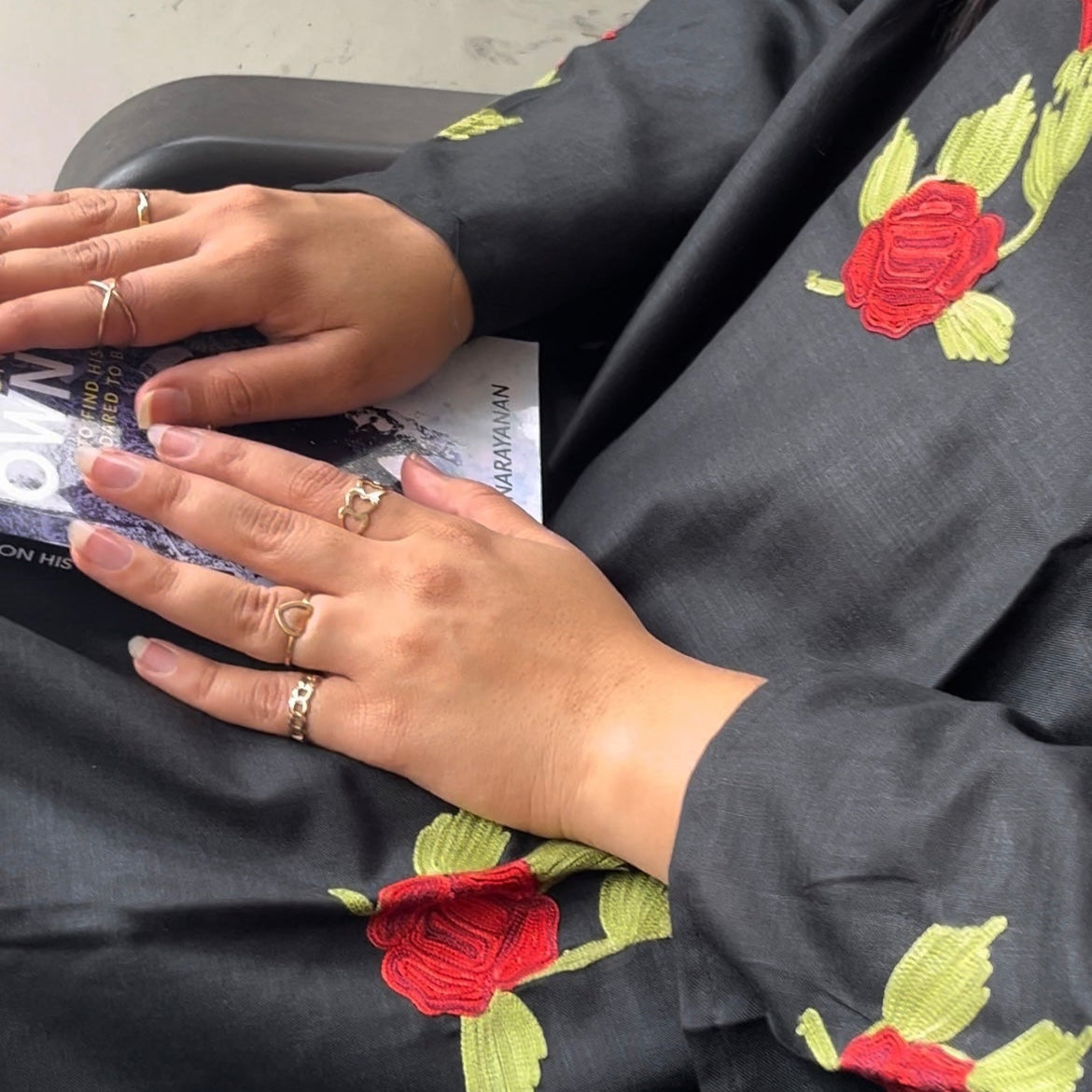 Close-up of self-textured detailing on Gul black kurta – premium fabric with subtle pattern