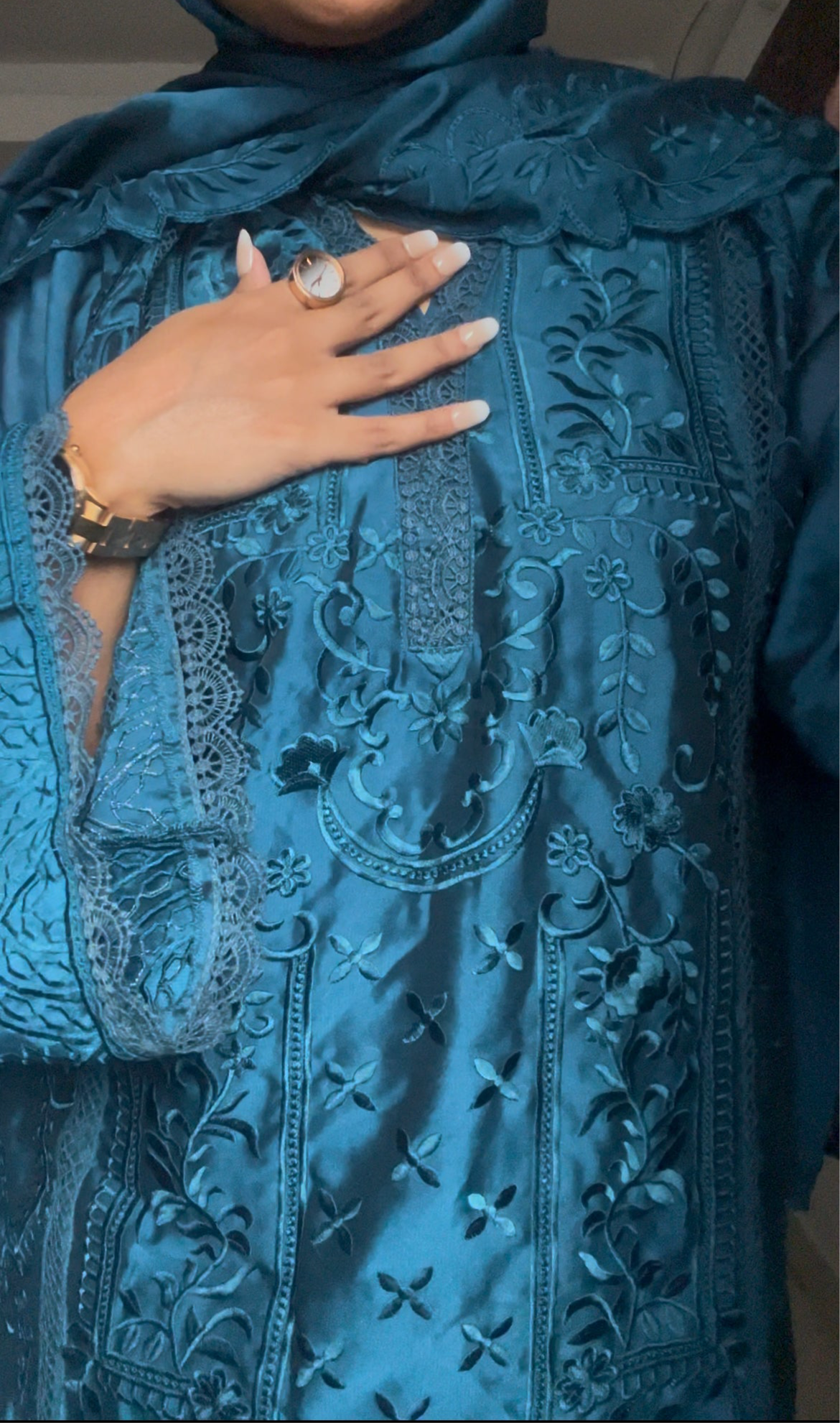 Front view of model wearing fully embroidered organza silk suit in midnight blue – loose Pakistani fit with bell sleeves