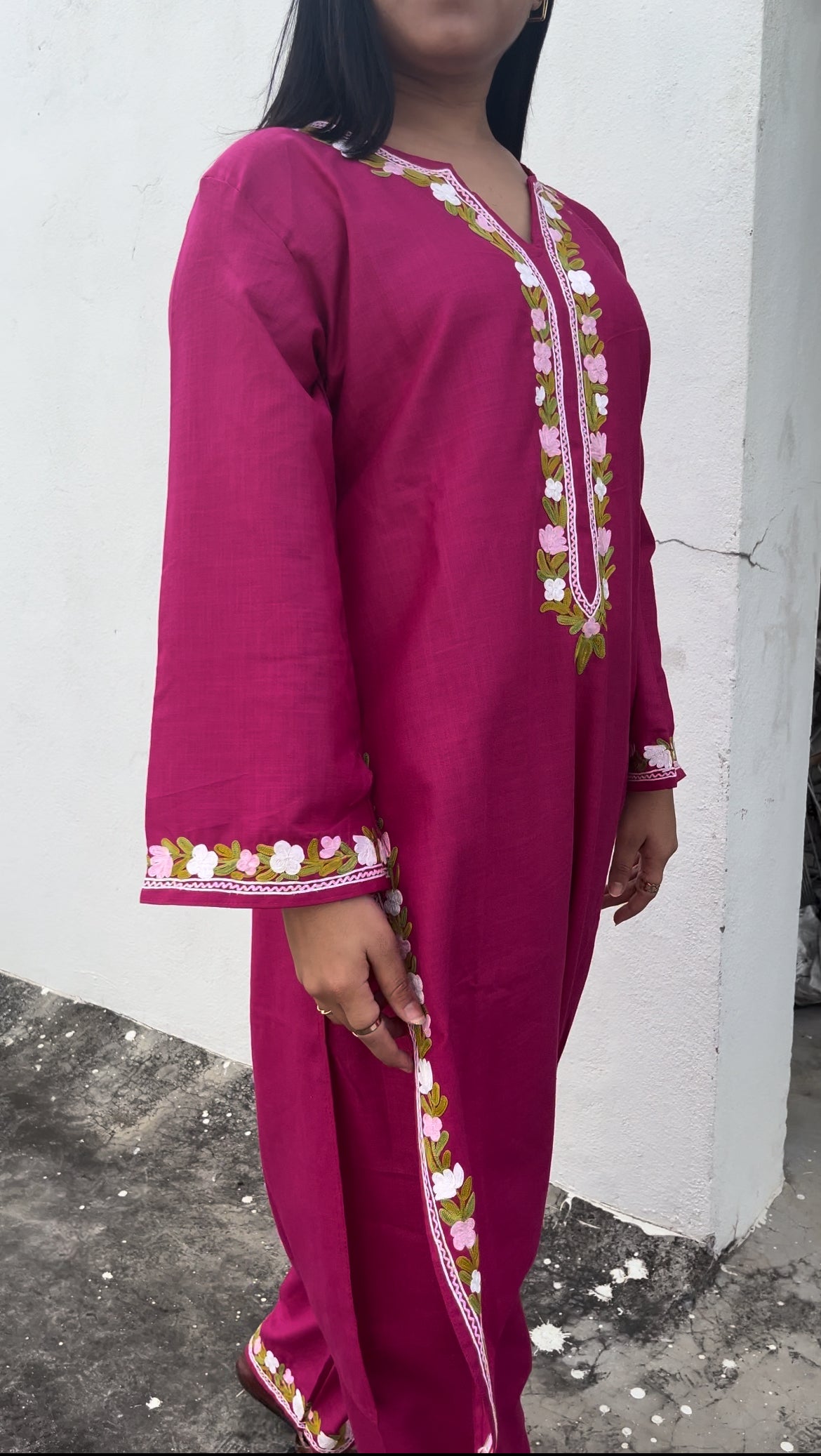 Back view of the Amairah white kurta set with minimal detailing and soft silhouette – Begum's