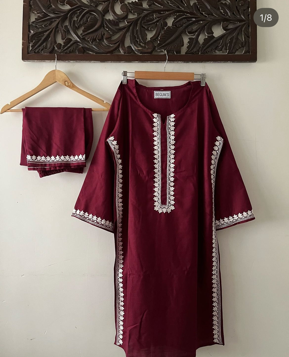 Flat-lay of BEGUM’S Sharjeena maroon embroidered kurta set — burgundy cotton kurta, matching embroidered bottoms, and dupatta displayed together to highlight motif coordination and styling options.