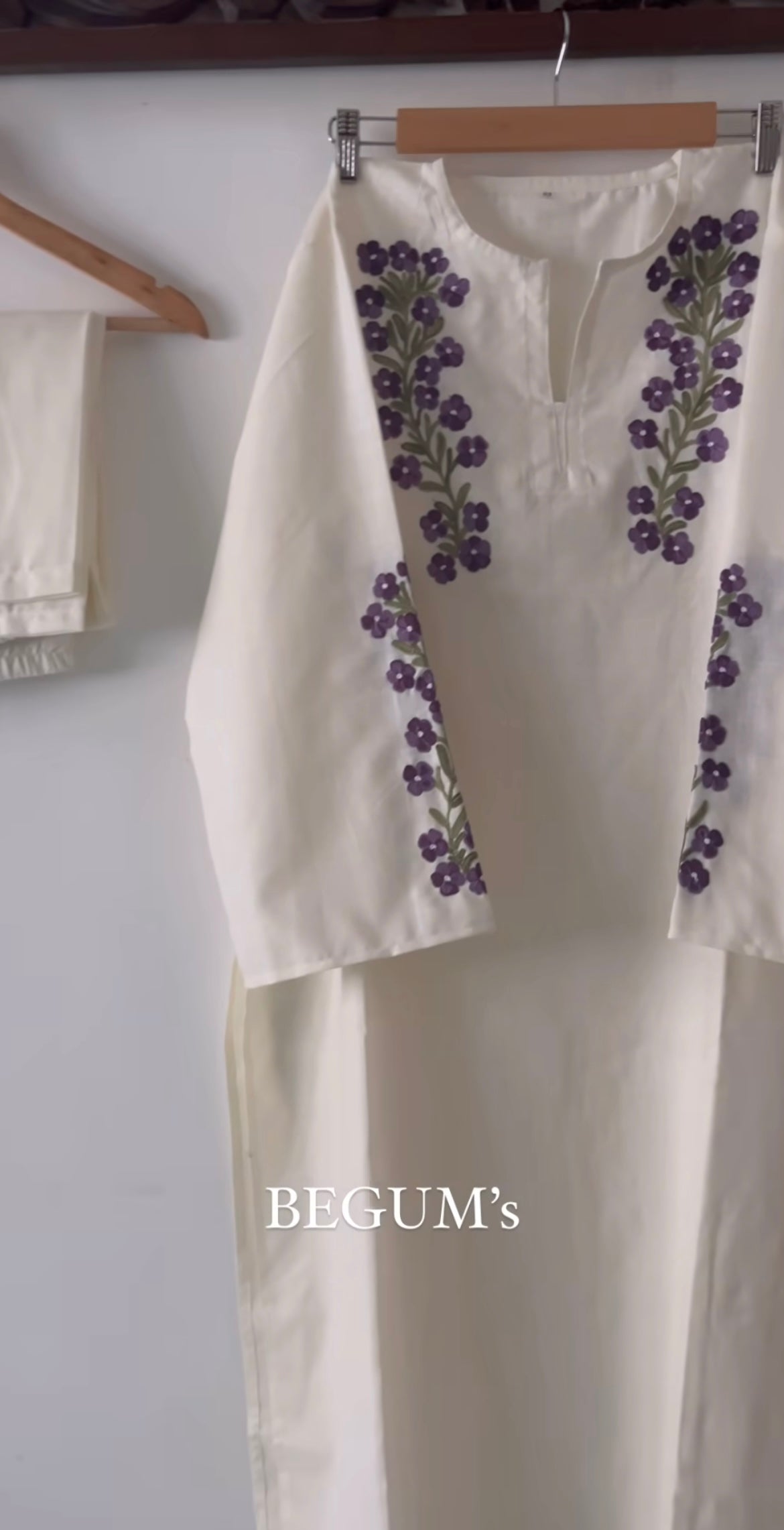 The ‘Bayaaz by BEGUM’S’ kurta — a richly embroidered tunic in jewel tones, with ornate detailing around the neckline and sleeves, styled over matching trousers.