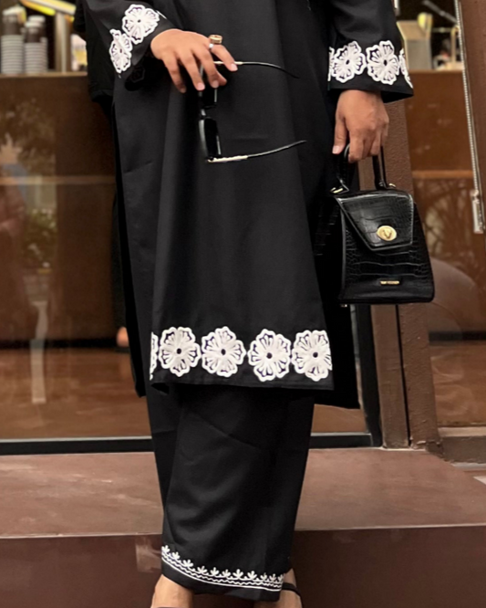 Elegant view of black and white embroidered kurta set, minimalist ethnic fashion